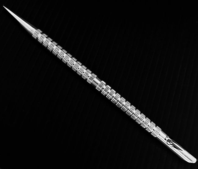 Spingicuticole-pusher metallo Kostka